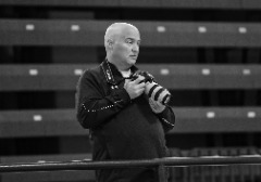 Chris Wenzler photographing JCU men's basketball.